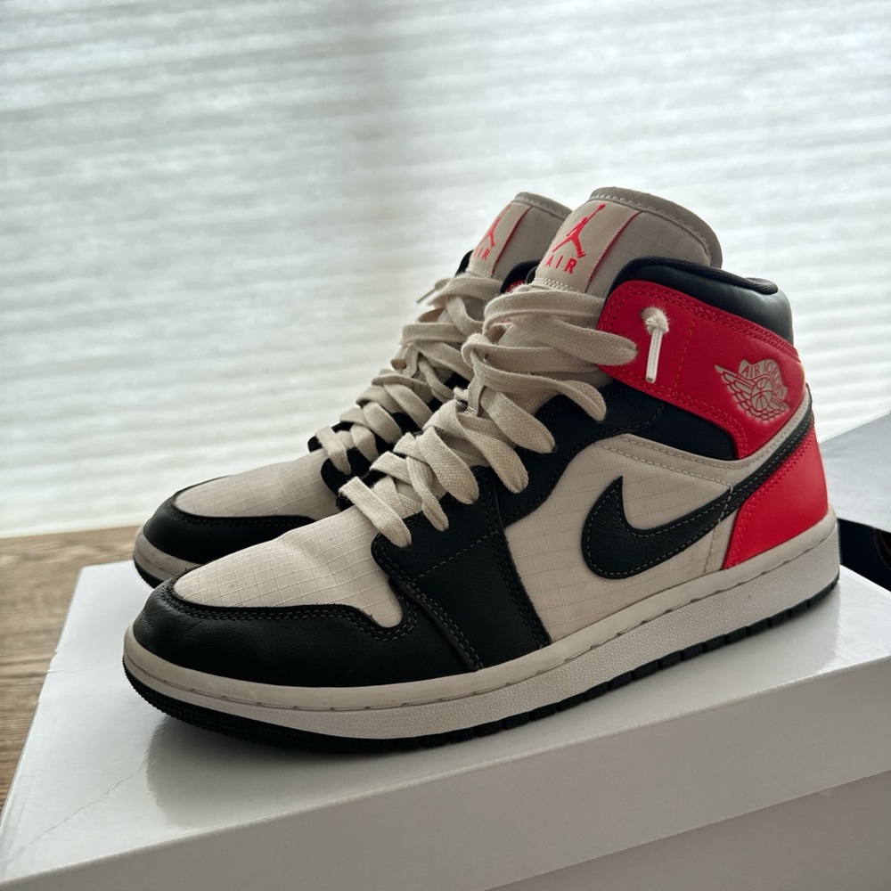 Air Jordan 1 Mid Sneakers in Black, White & Red
